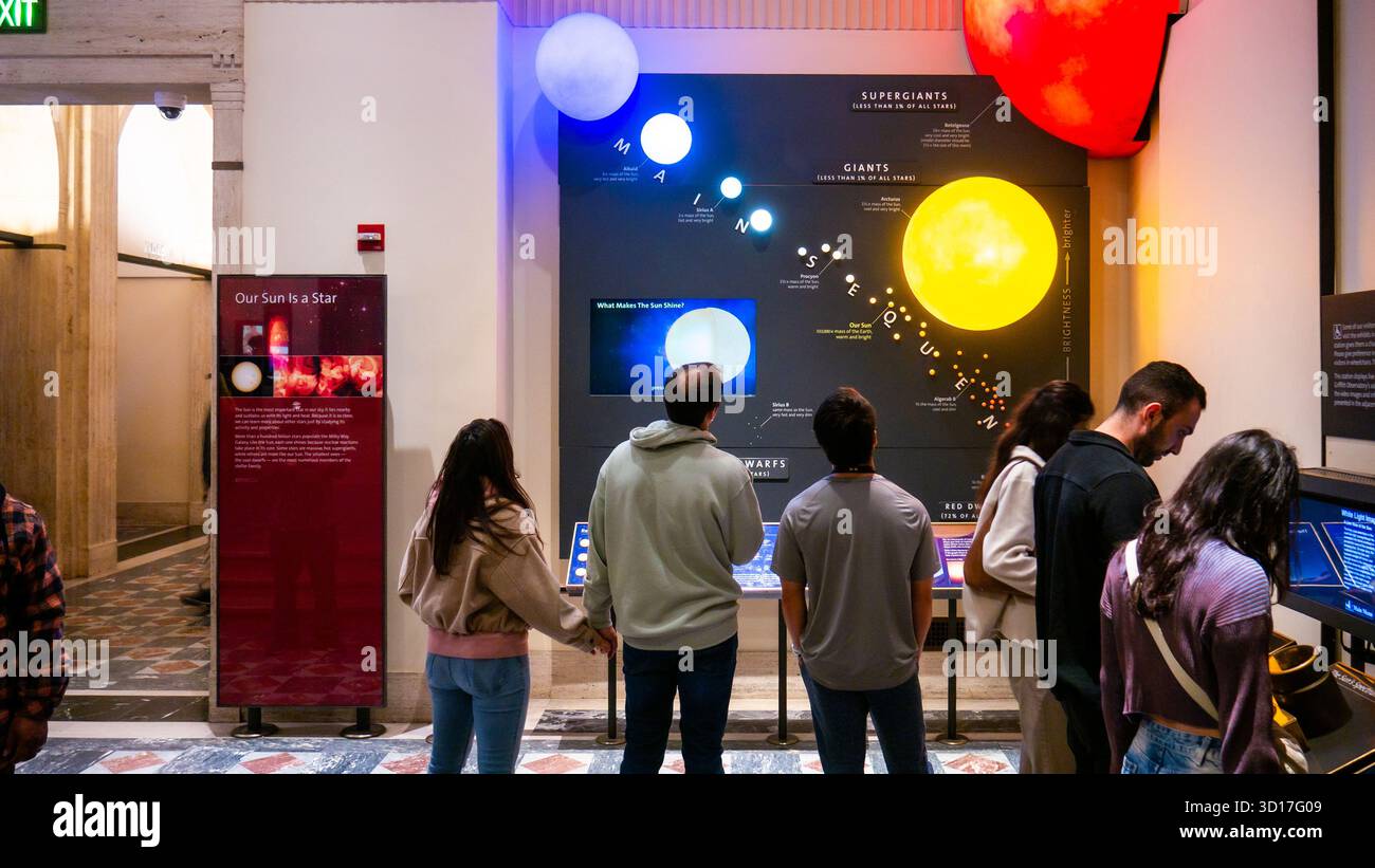 Los Angeles, USA. 25th October, 2025. Visitors viewing a display ...