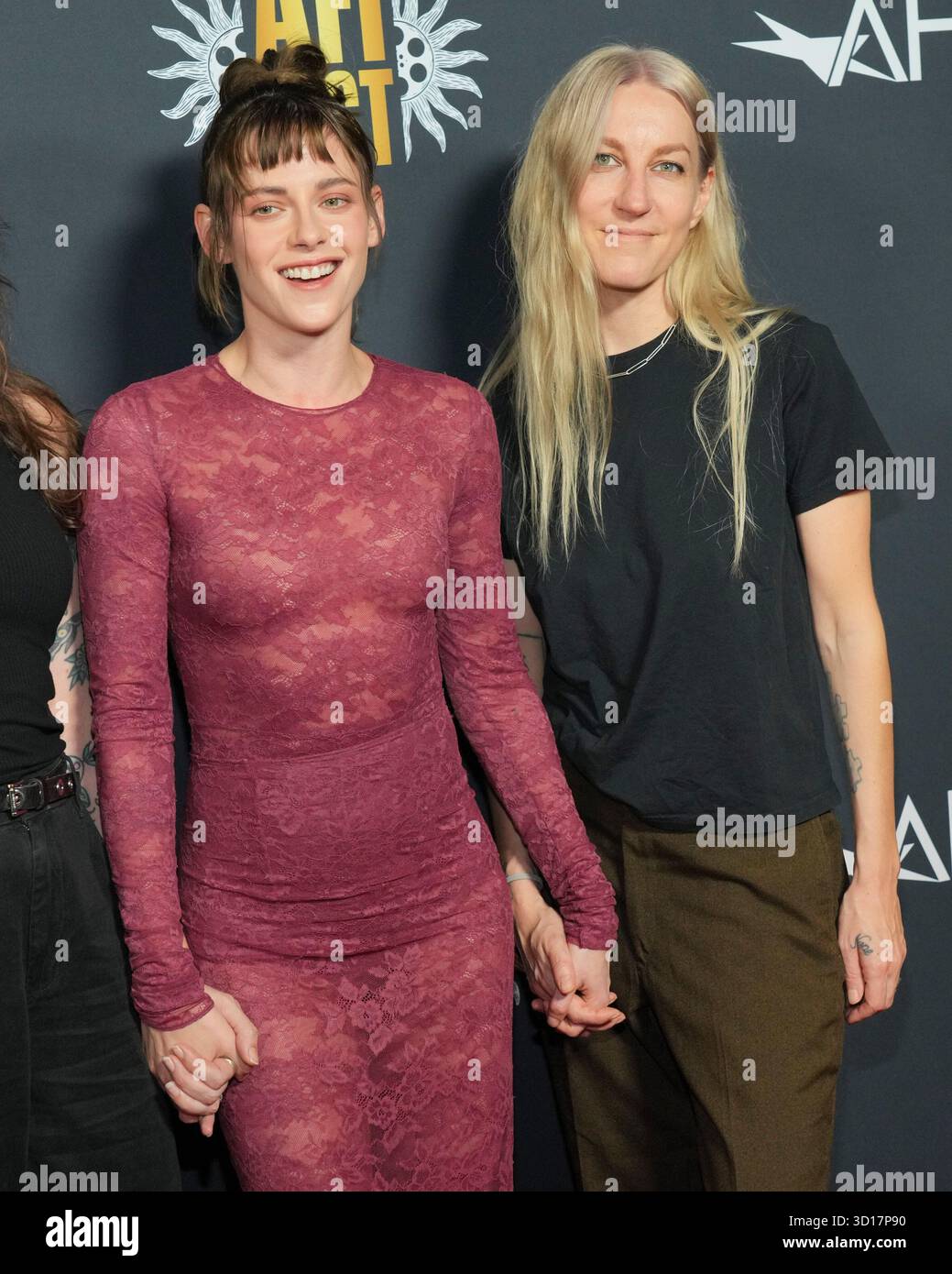 Kristen Stewart, left, and Dylan Meyer arrive at an AFI Fest screening ...