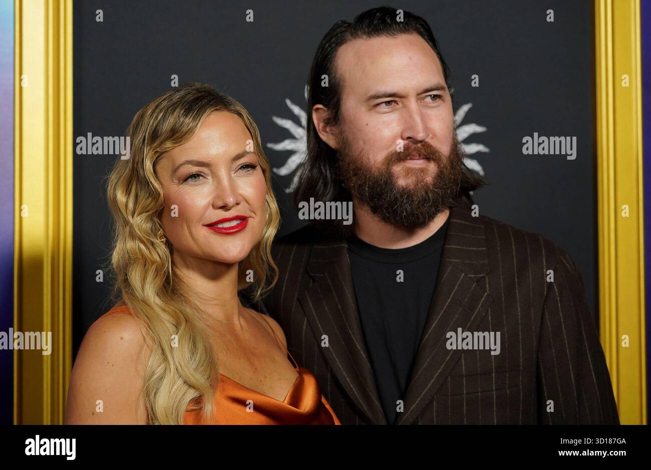 Kate Hudson, left, and Danny Fujikawa arrive at the AFI Fest premiere ...