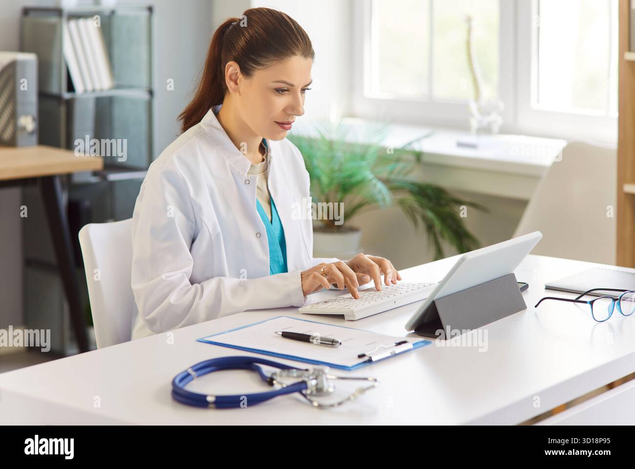 Telemedicine workflow doctor typing hi-res stock photography and images ...