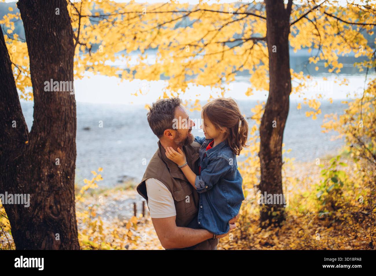 Father and daughter together in the forest hi-res stock photography and ...