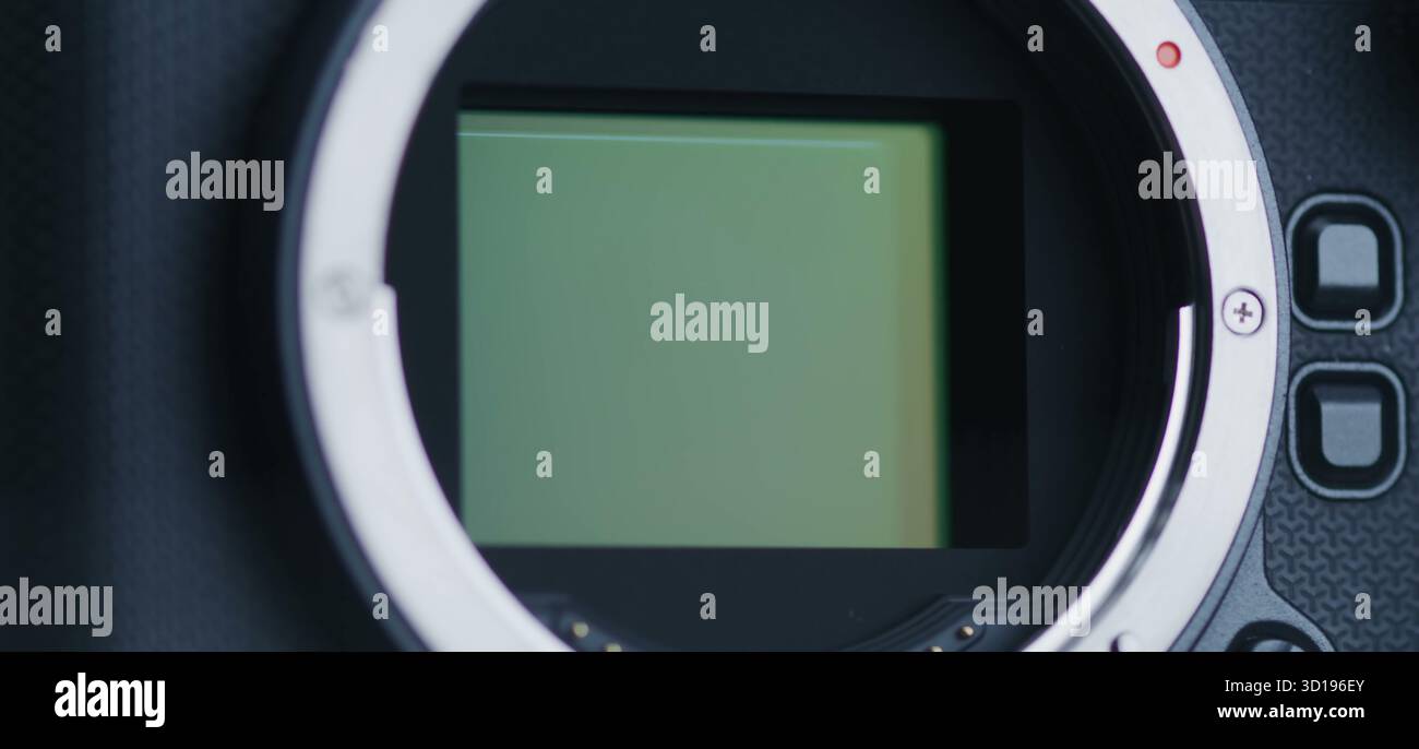 The camera sensor is revealed, showcasing its delicate internal. Stock Photo