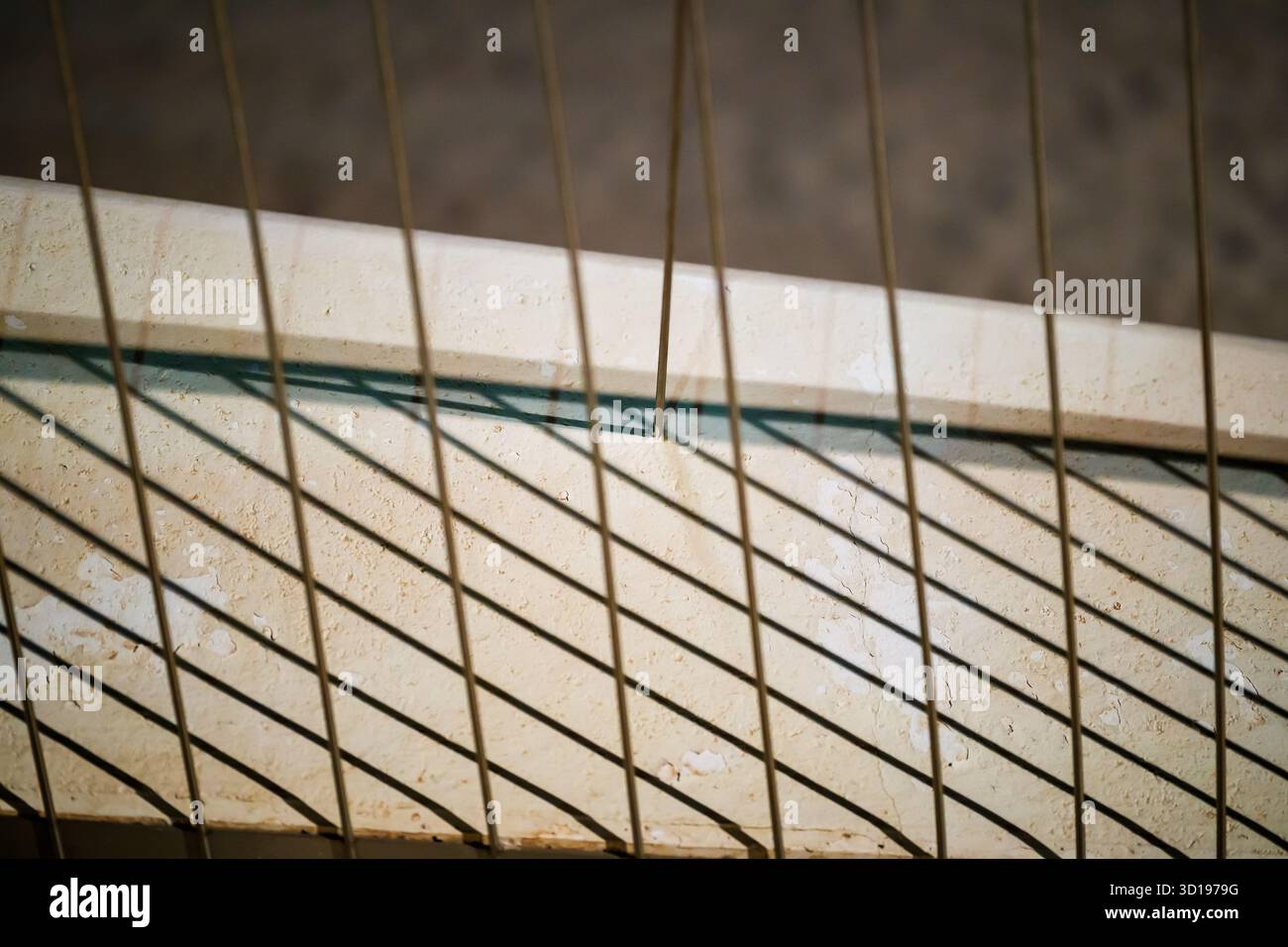 Geometric Shadows on a Concrete Edge Stock Photo