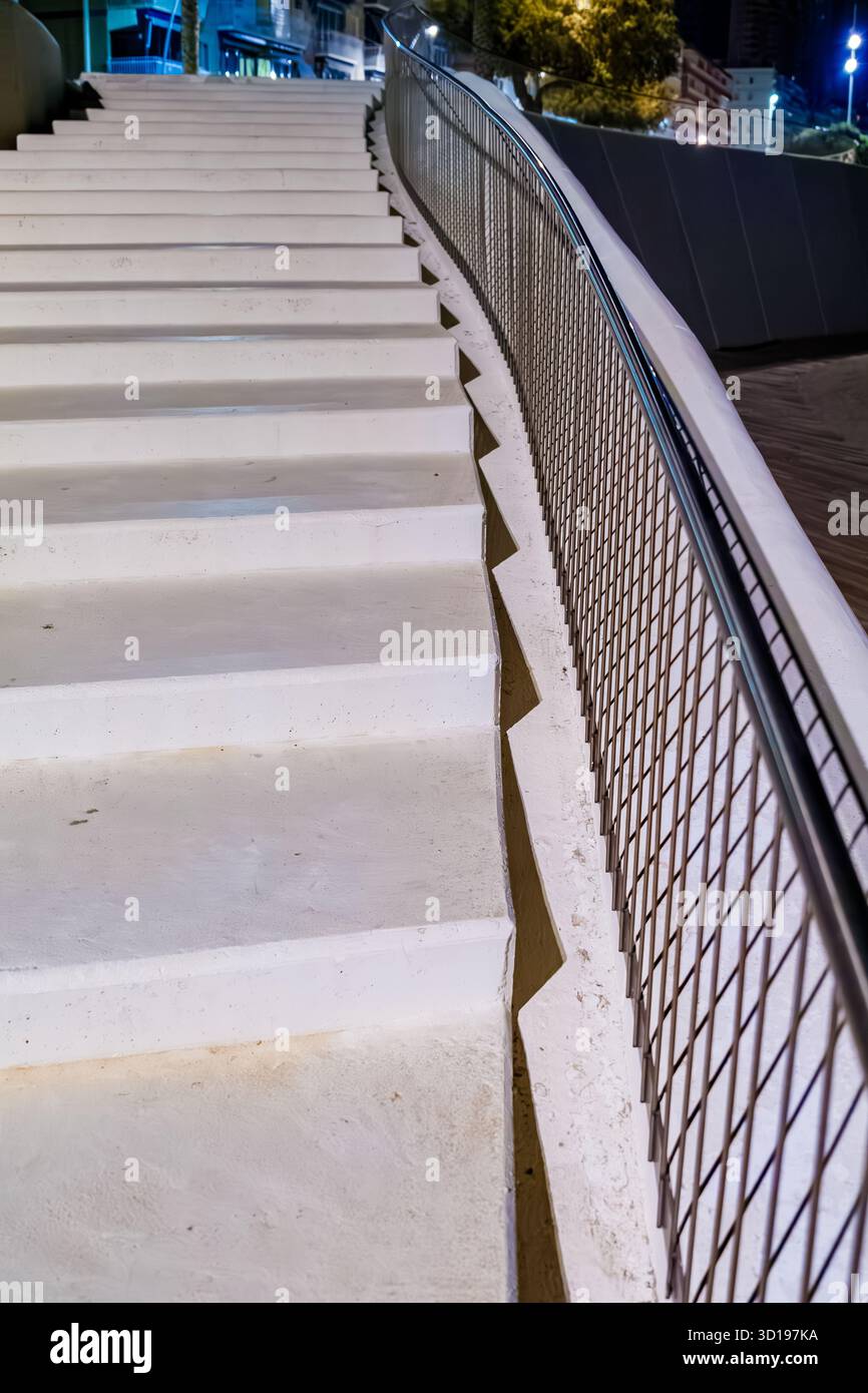 Close-Up of Ascending Steps and Woven Wire Railing Stock Photo - Alamy