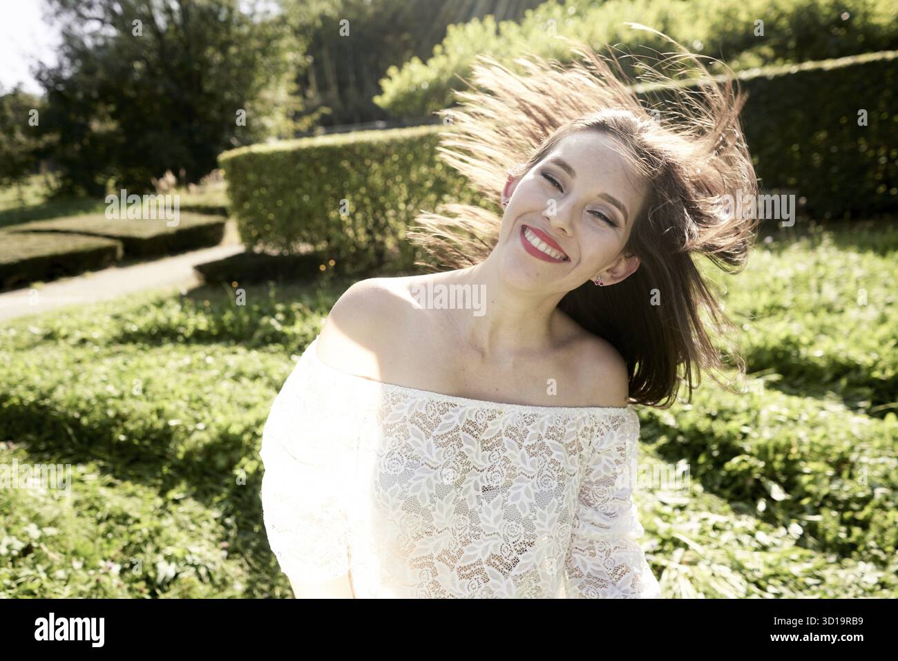 Easygoing about imperfect vibrant tousled hairstyle Stock Photo