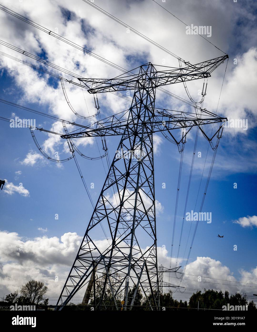 Atached Pylon DIEMEN - A Tennet power station. High-voltage pylons dot the landscape ...