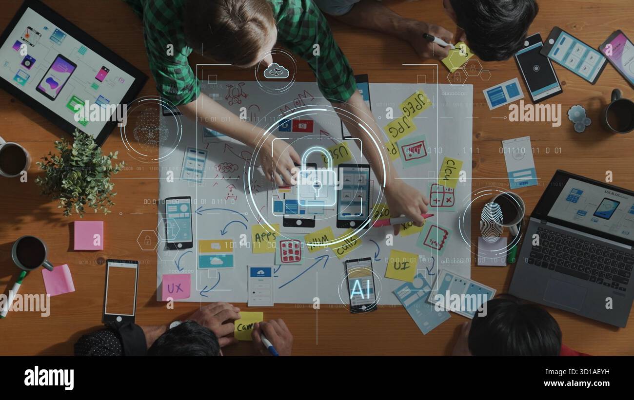 A vibrant workspace showcasing a collaborative brainstorming session on application design, emphasizing user experience and innovative technology solu Stock Photo