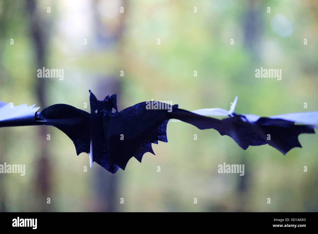Black Paper Bat Halloween Decoration Hanging Outdoors Stock Photo Alamy