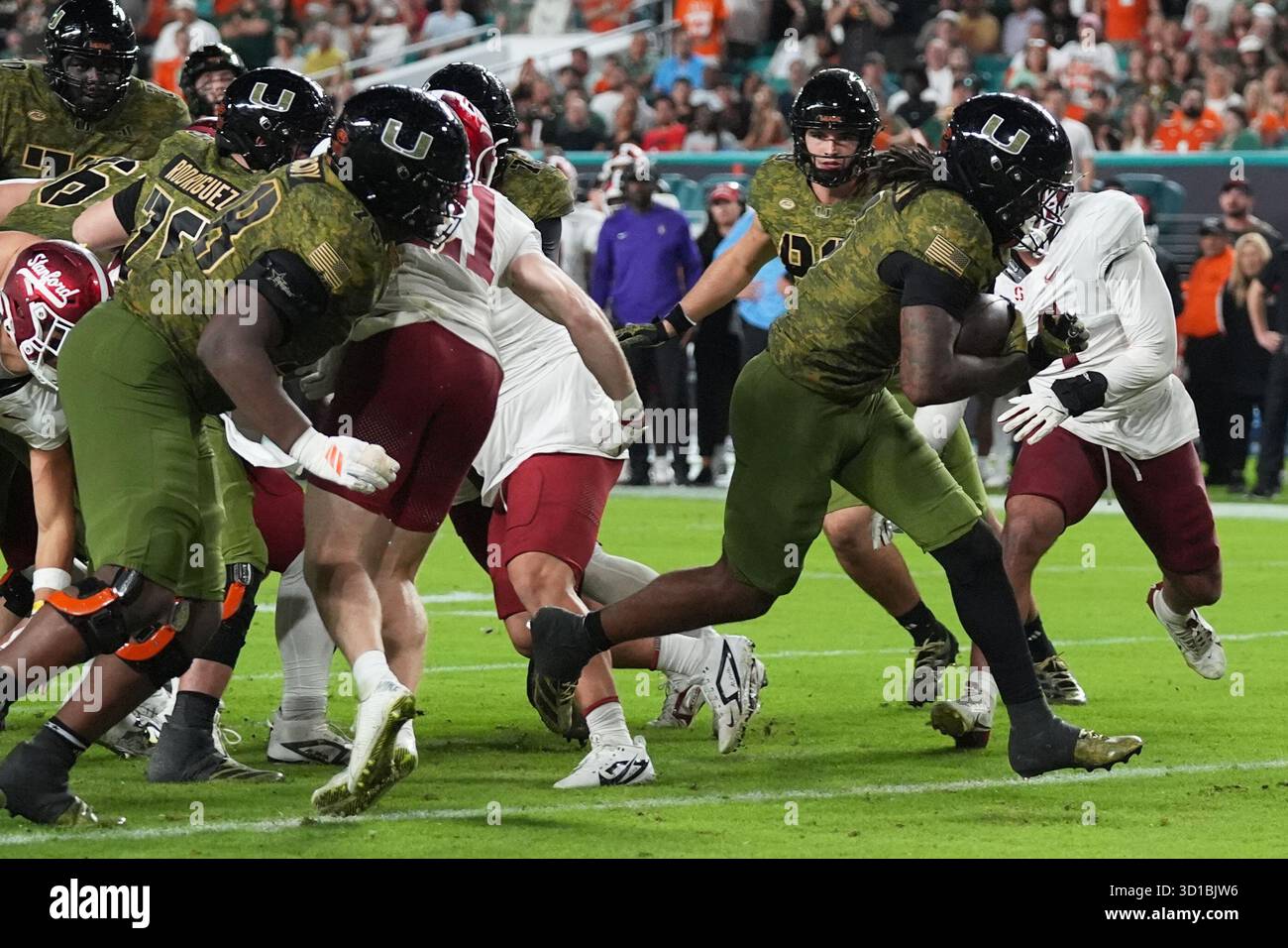 Miami Running Back Mark Fletcher Jr Right Scores A Touchdown During