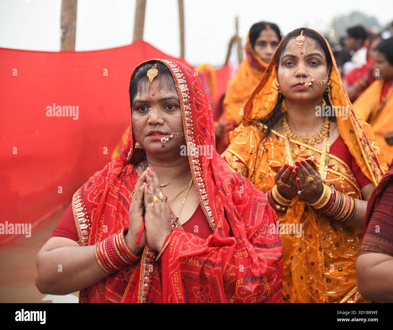 PATNA, INDIA - OCTOBER 27: Chhath devotees perform rituals in the Ganga ...