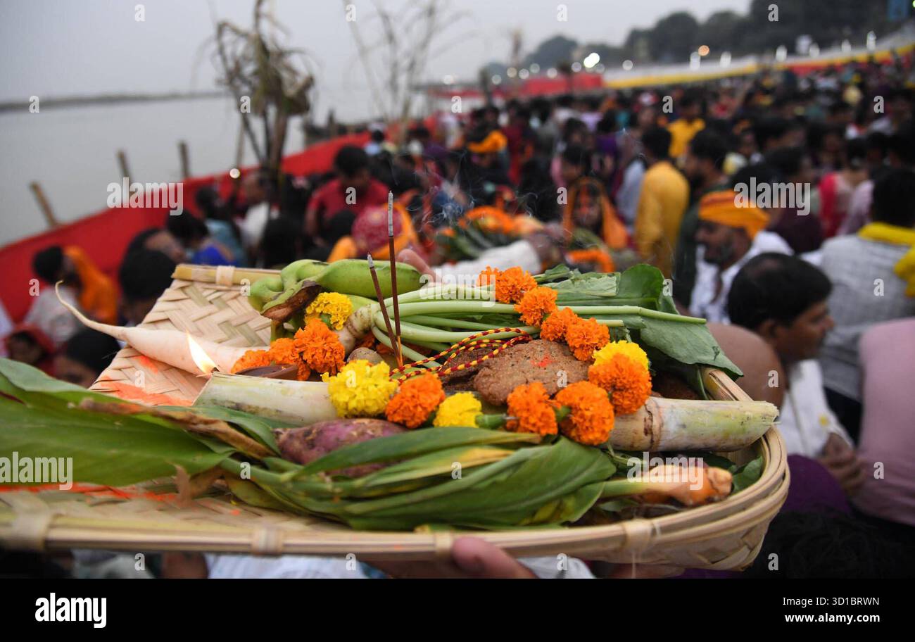 PATNA, INDIA - OCTOBER 27: Gather of Chhath devotees around Ganga river ...