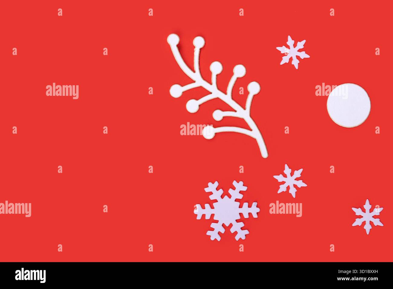 Christmas composition with decorative snowflakes on red background, copy space Stock Photo