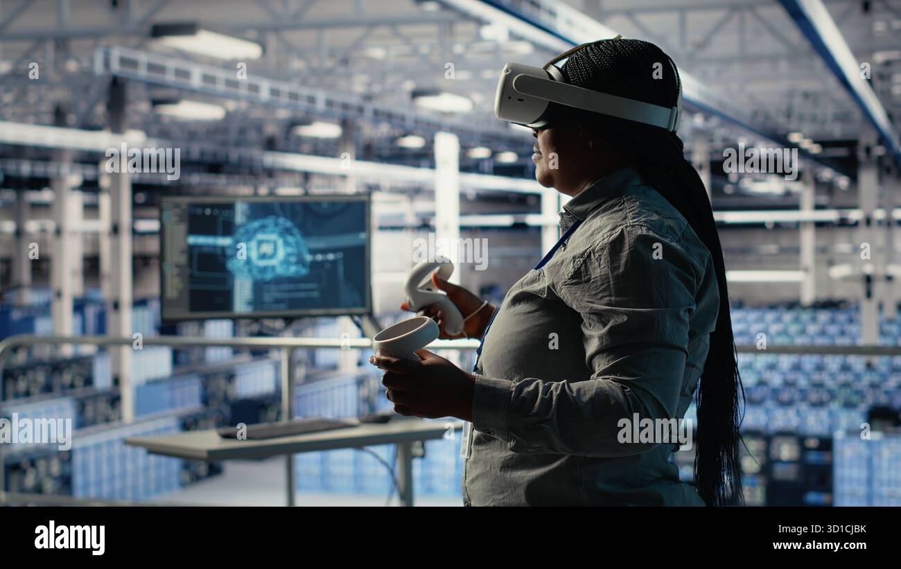Data center technician using virtual reality, improving AI rigs processing speed. Server hub IT expert using VR headset to manage gear providing support for artificial intelligence workloads, camera B Stock Photo