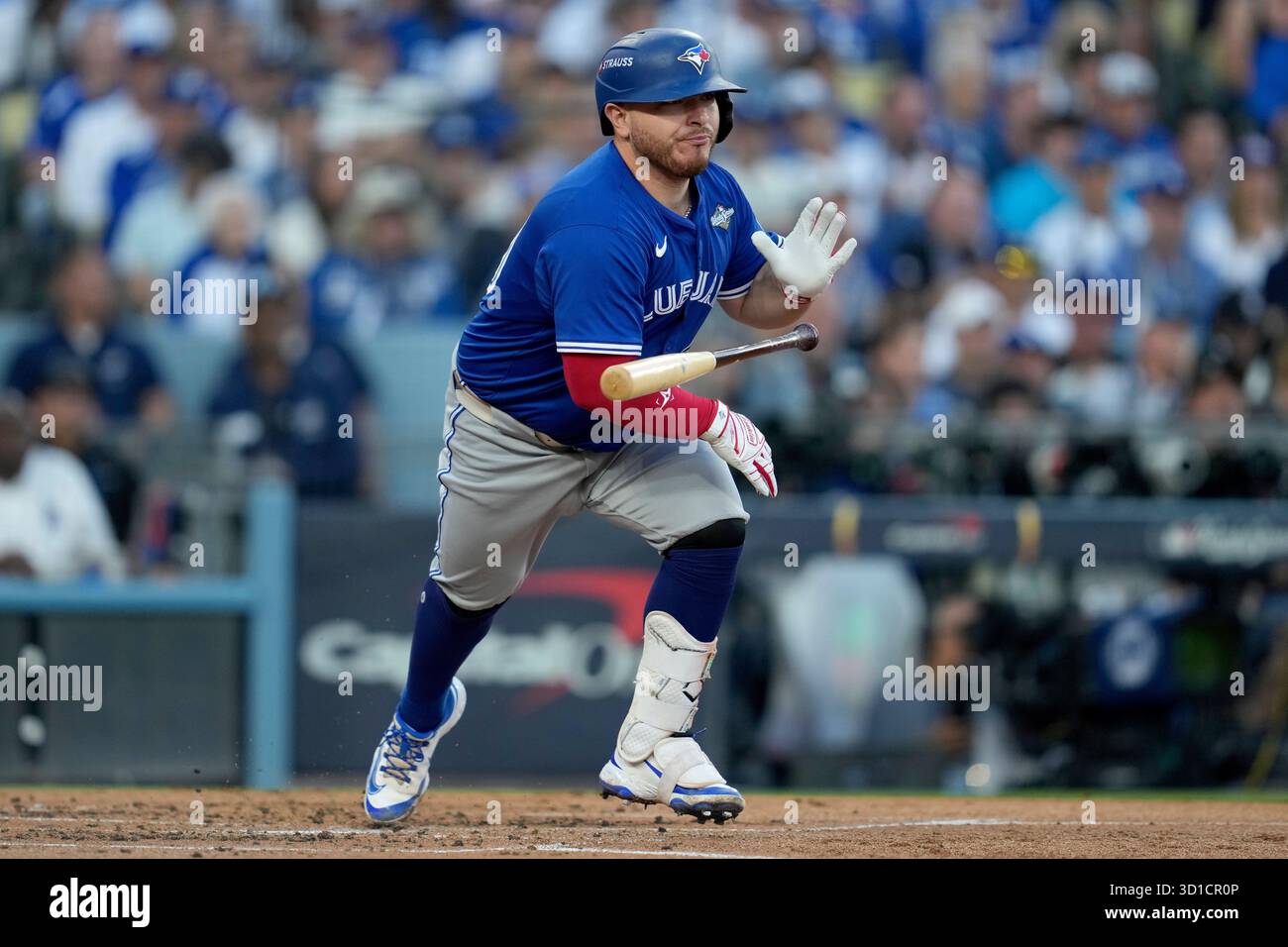Toronto Blue Jays' Alejandro Kirk runs out a base hit against the Los ...