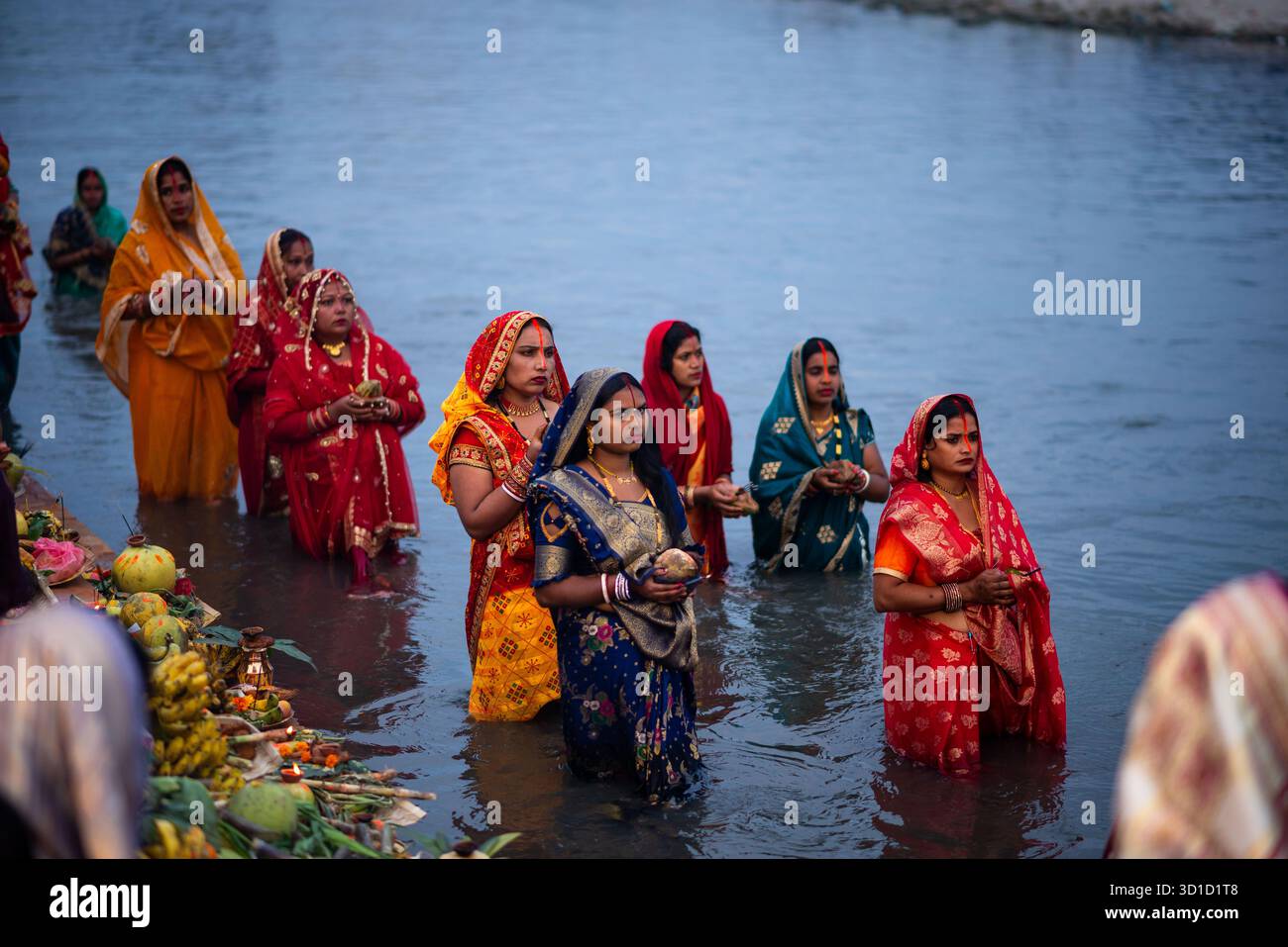 A devotees offering prayers as part of rituals during the celebration ...