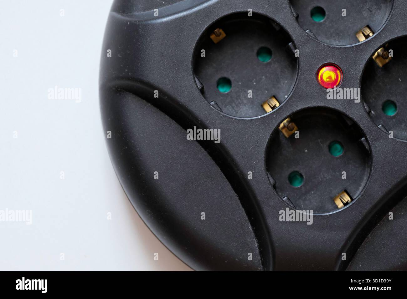 Rolled extension with a red light indicator signals Stock Photo