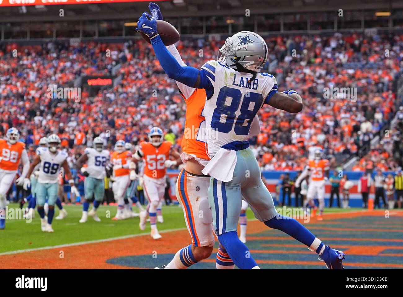 Denver Broncos cornerback Riley Moss (21) breaks up a pass for Dallas ...