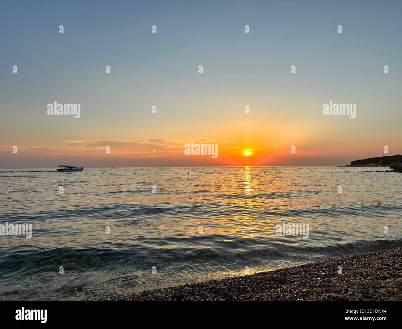 Sea sunset in Croatia with a boat - Smartphone Captured Stock Image