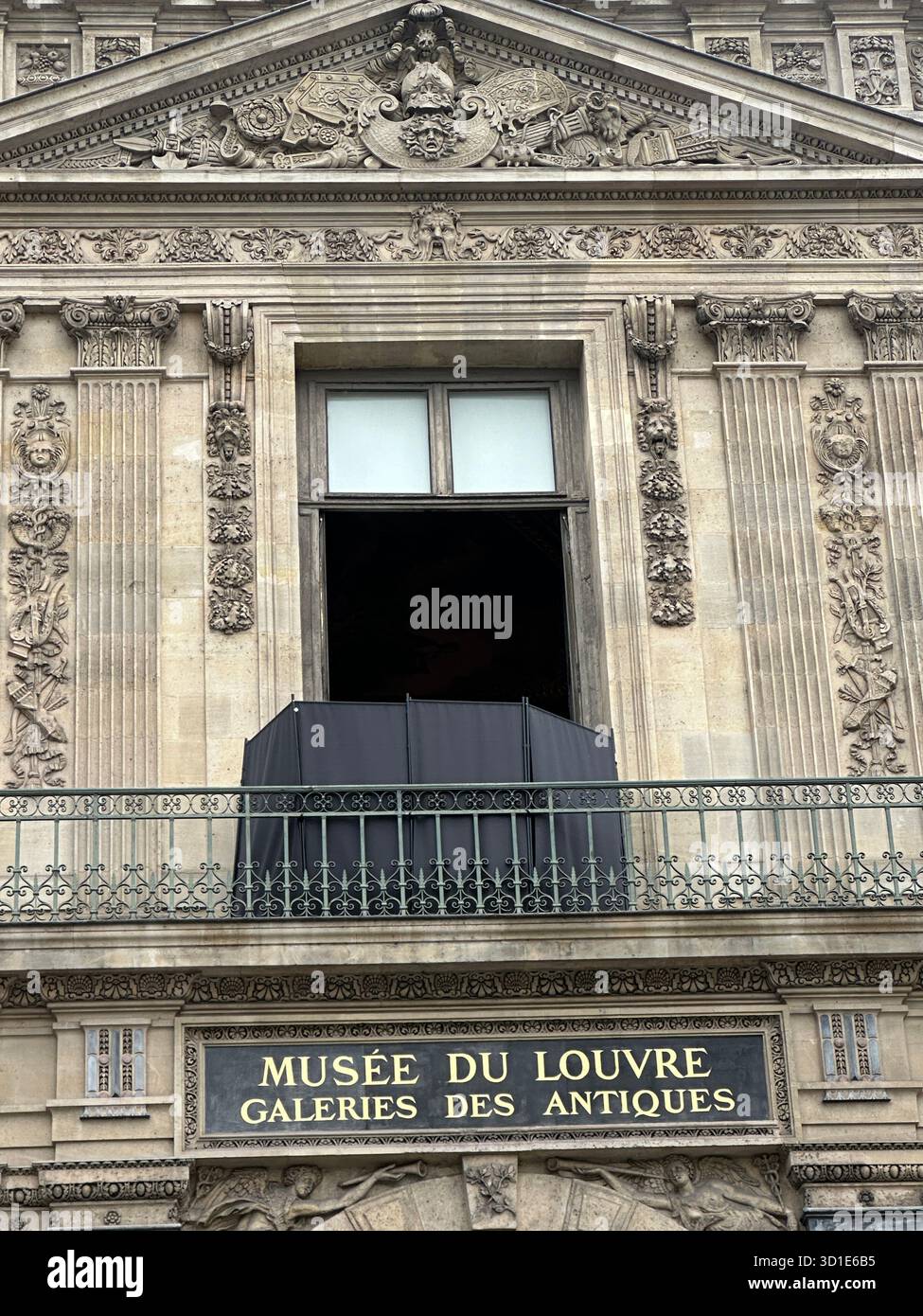 Louvre heist 19 October 2025 Paris. . Broken windows with black screen. - Smartphone Captured Stock Image