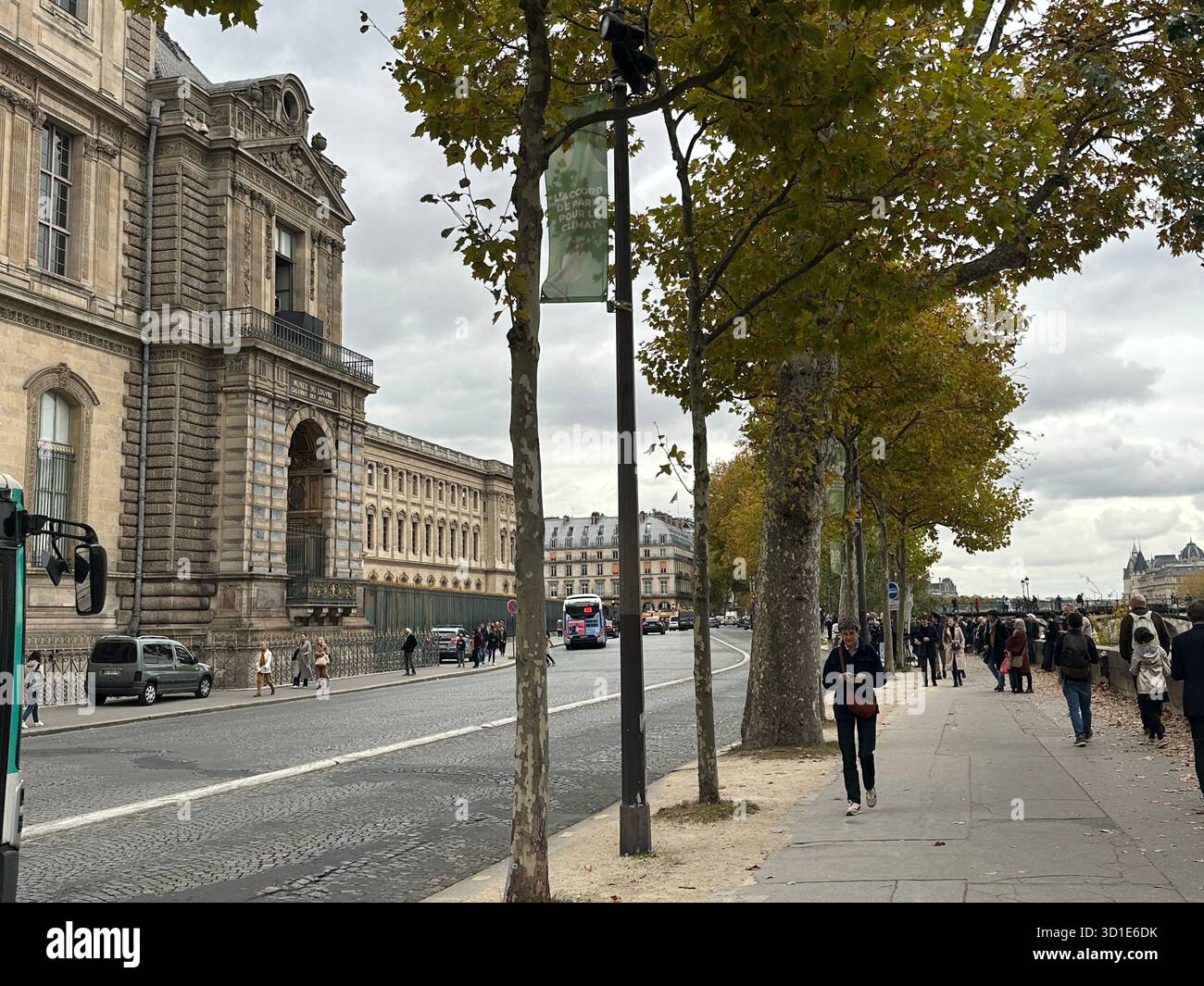 Louvre heist Paris 29 October 2025. Jewels robbery. Open window at historic facade. Street scene with tourists. Crime scene becomes tourist attraction - Smartphone Captured Stock Image
