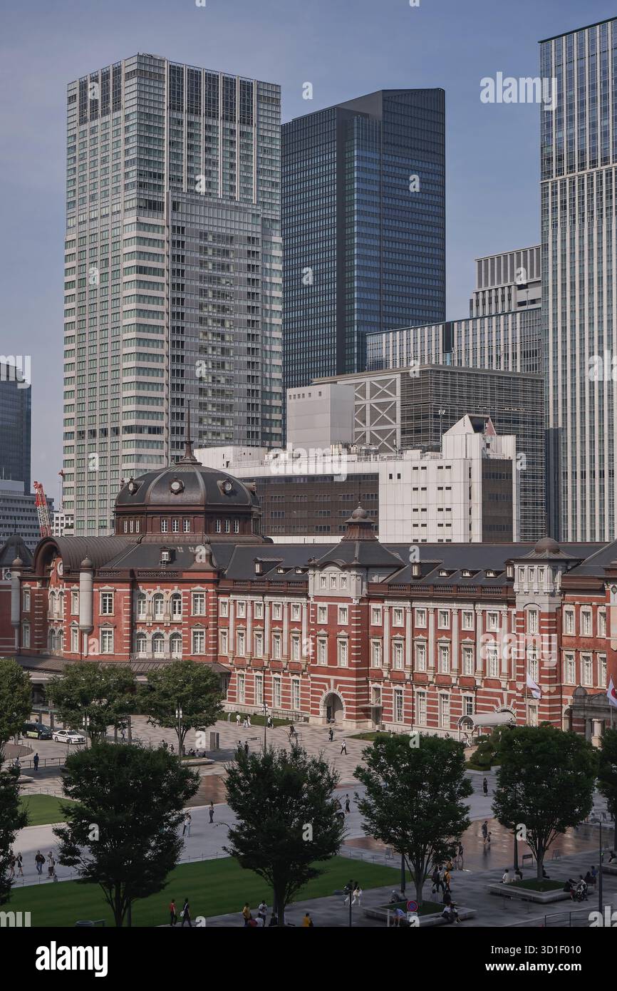 The Iconic Red Brick Tokyo Station with Skyscrapers - Japan Stock Photo ...