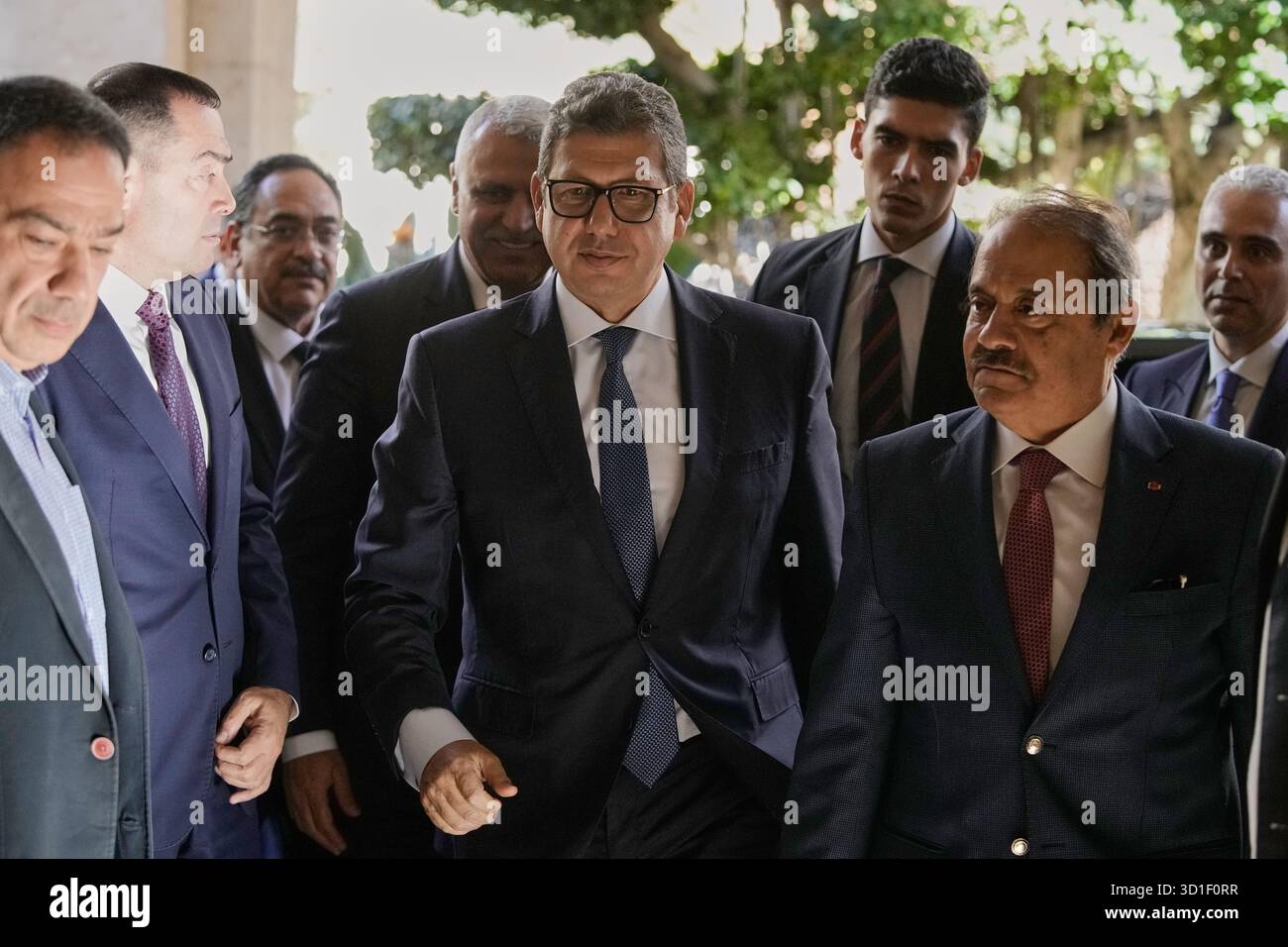 Egypt's intelligence chief Hassan Rashad, center, arrives for a meeting ...