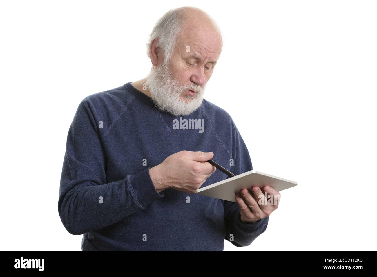 Funny bald and bearded old man using tablet computer, isolated on white Stock Photo