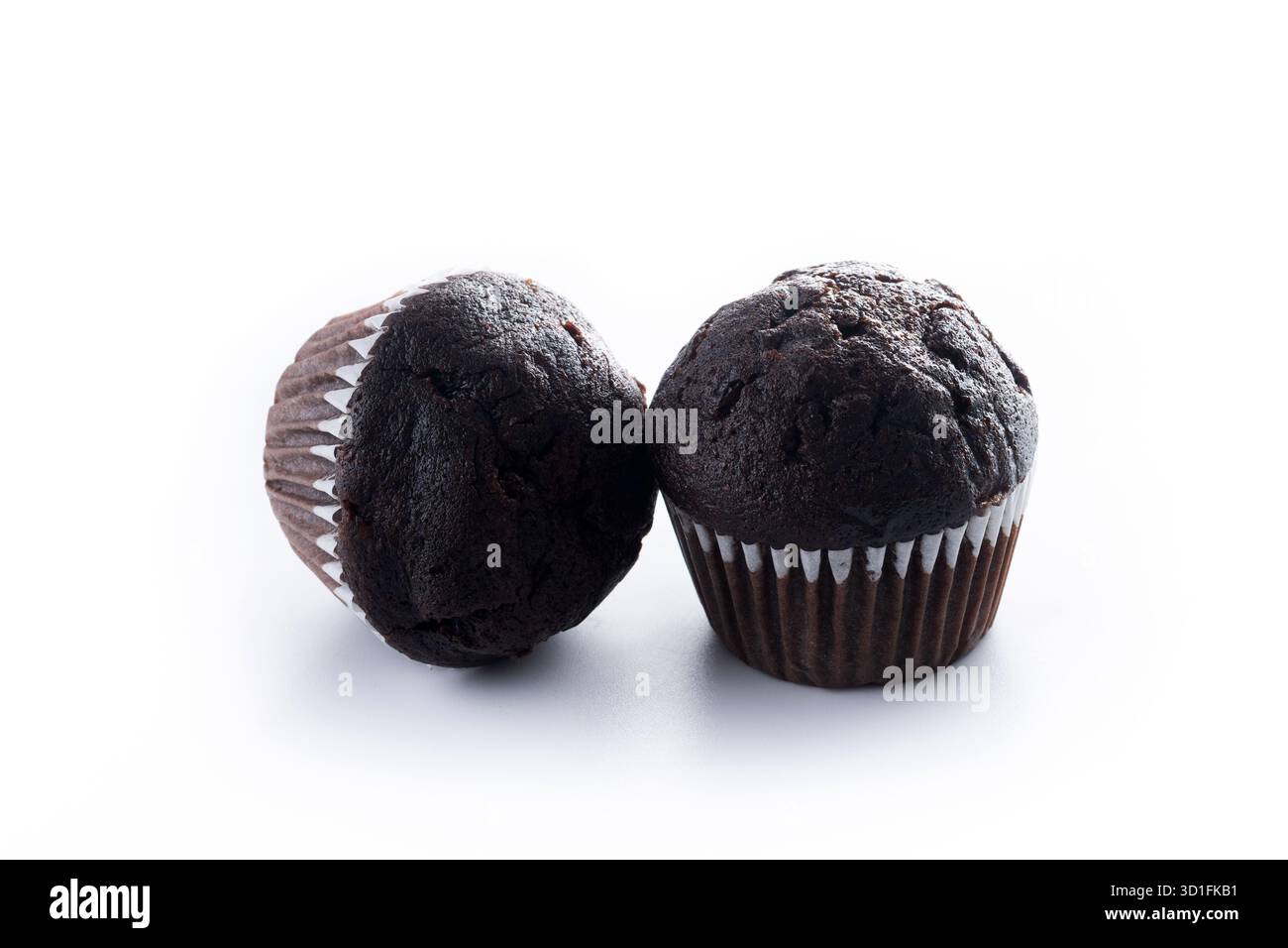 Chocolate muffins isolated on white background Stock Photo