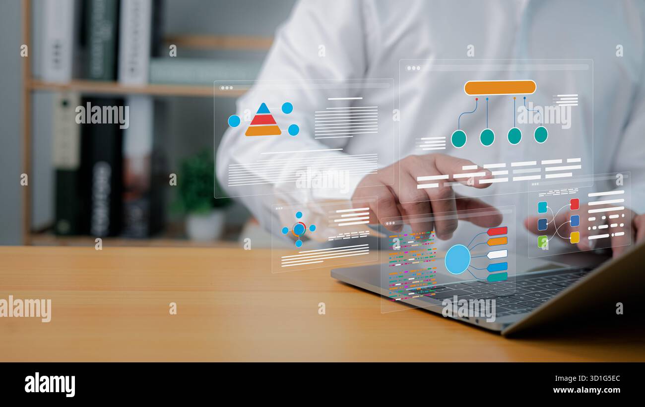 Businessman using laptop with virtual data analytics and infographic interface. Concept of business intelligence, data visualization, digital transfor Stock Photo