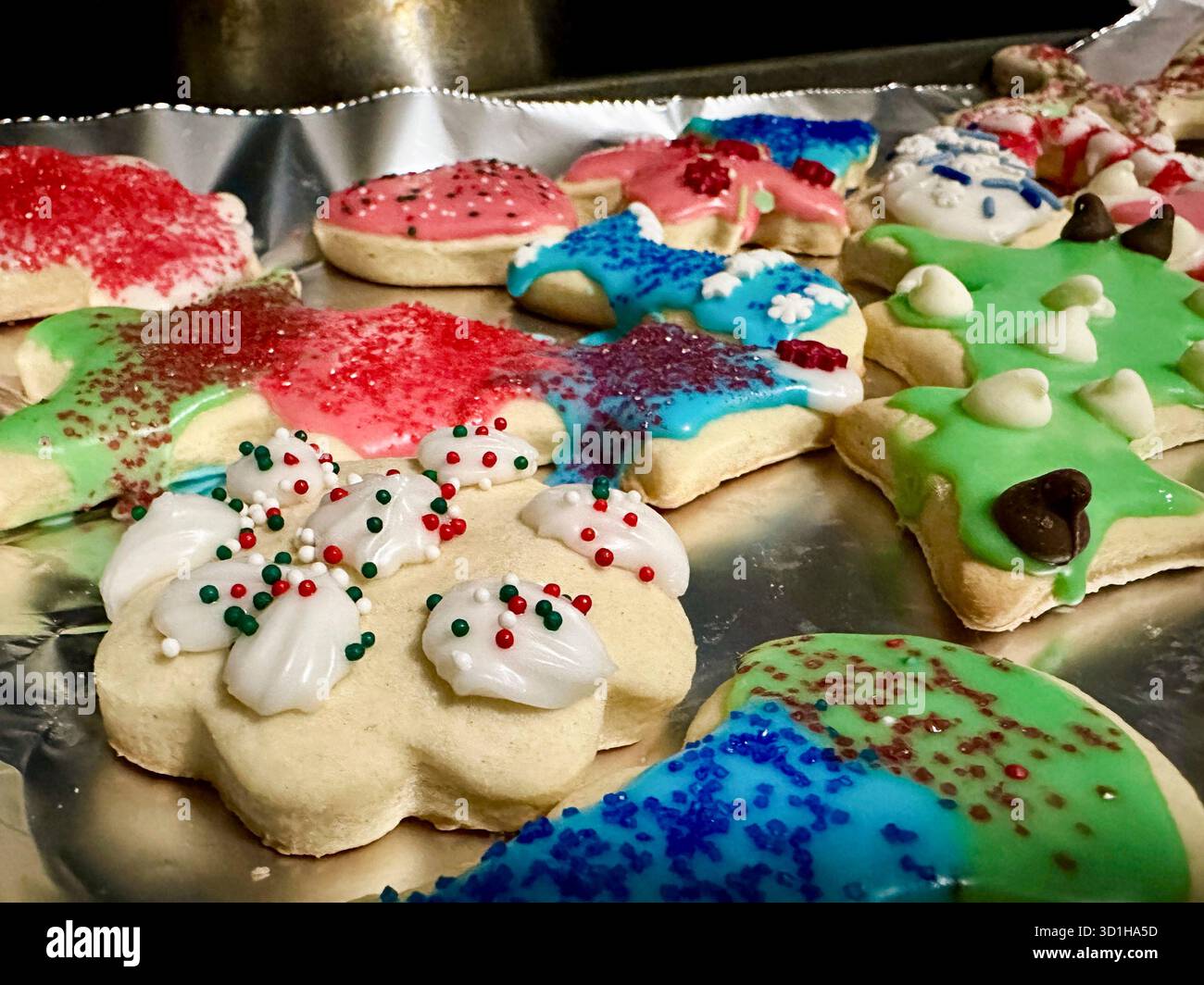 Decorated cookies on a baking sheet, selective focus Stock Photo