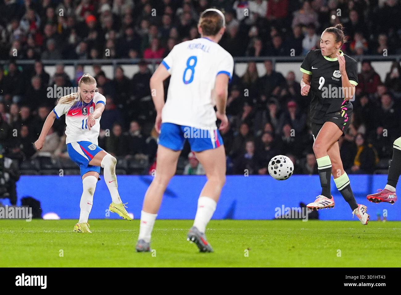 England's Aggie Beever-Jones (left) scores their side's first goal ...