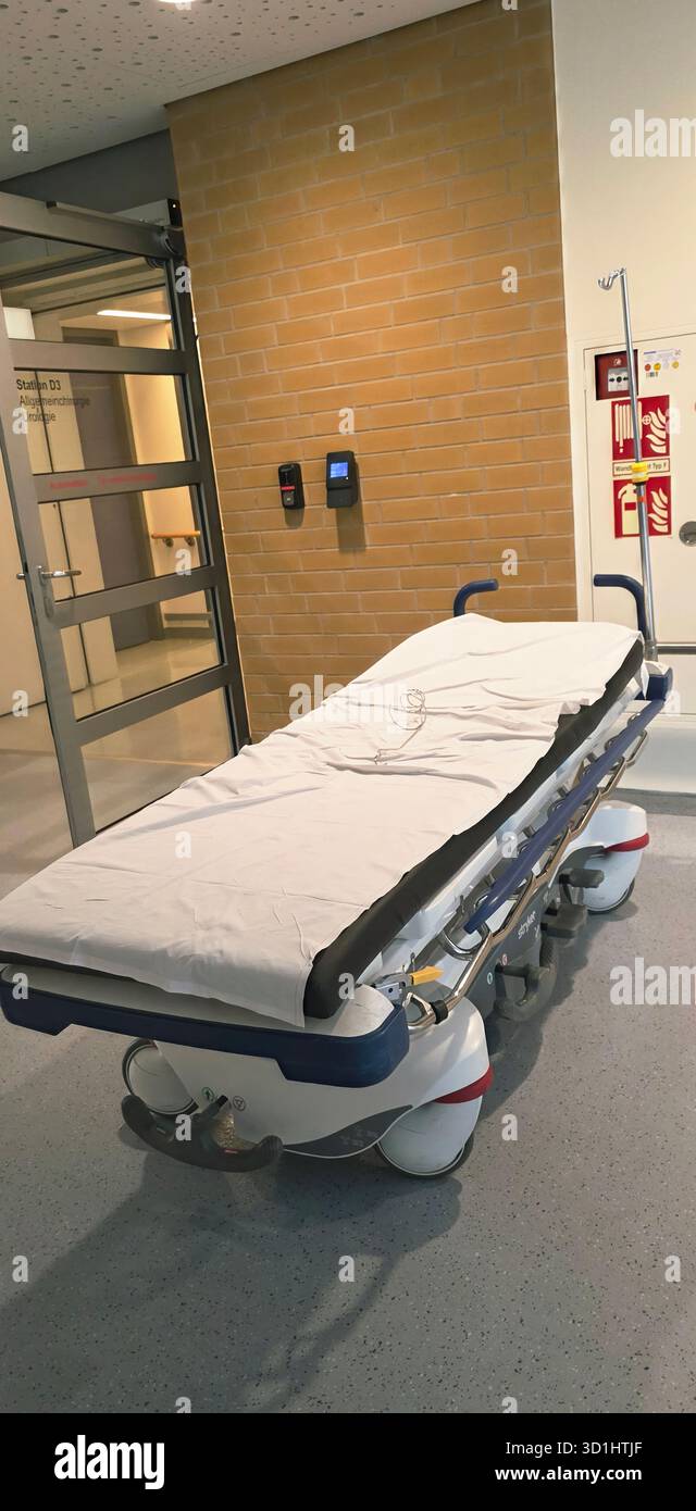Belin, Germany - May 30, 2025: Hospital stretcher is positioned in a medical facility with a clean and modern design. Hospital - Smartphone Captured Stock Image