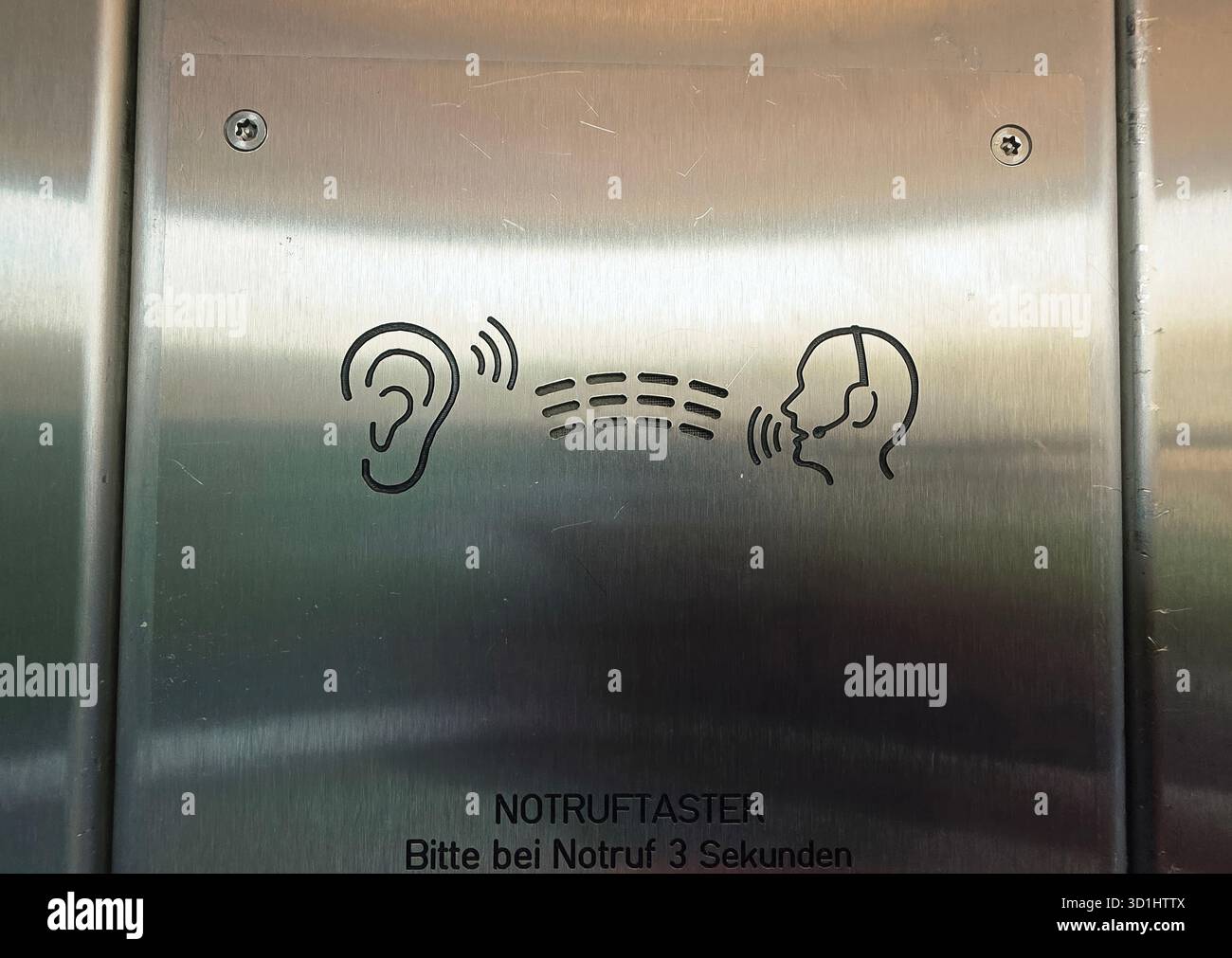 Belin, Germany - May 30, 2025: Emergency communication symbol displayed on stainless steel elevator panel. Hospital - Smartphone Captured Stock Image