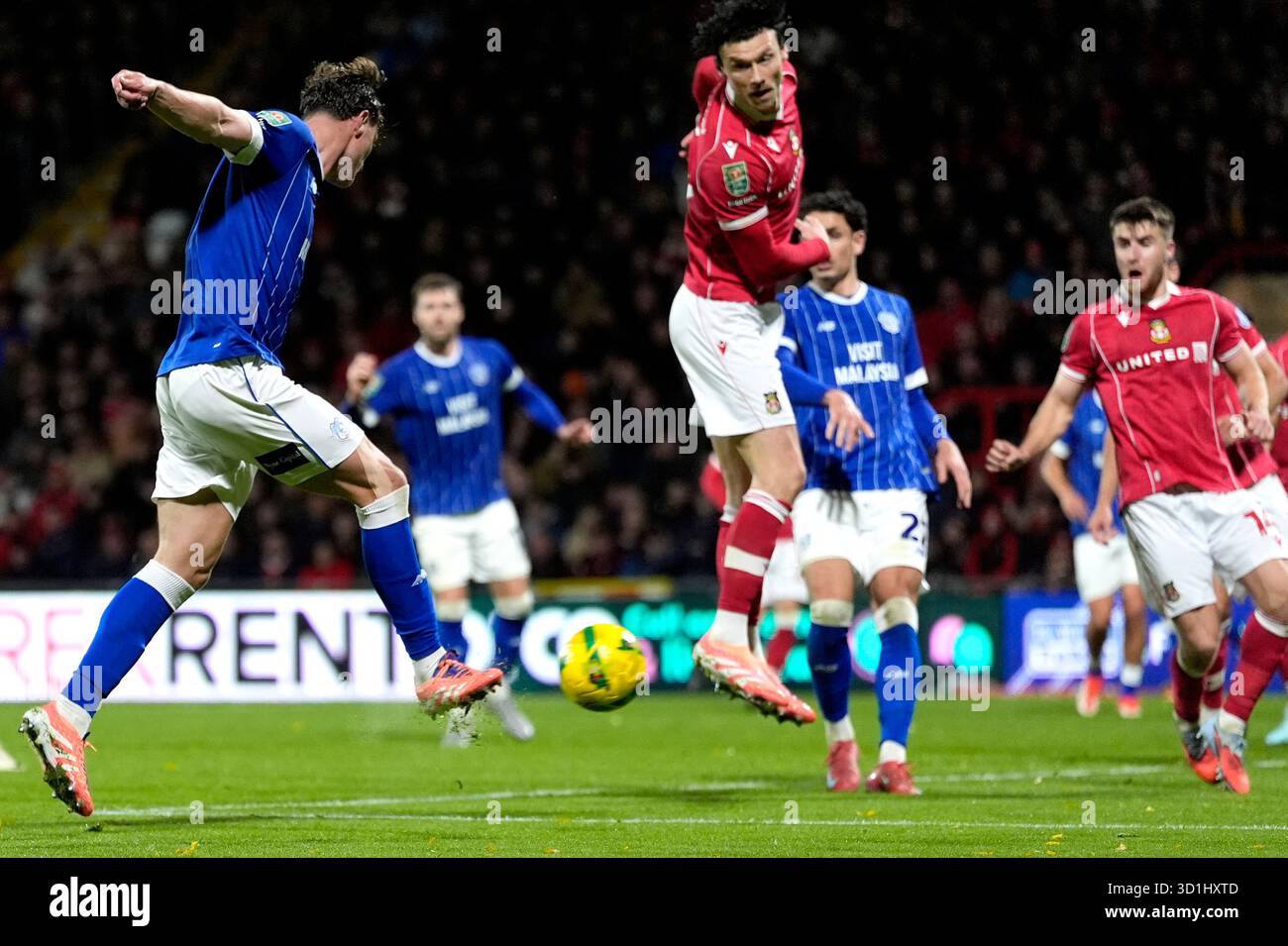 Cardiff City's William Fish (left) scores their side's second goal of ...