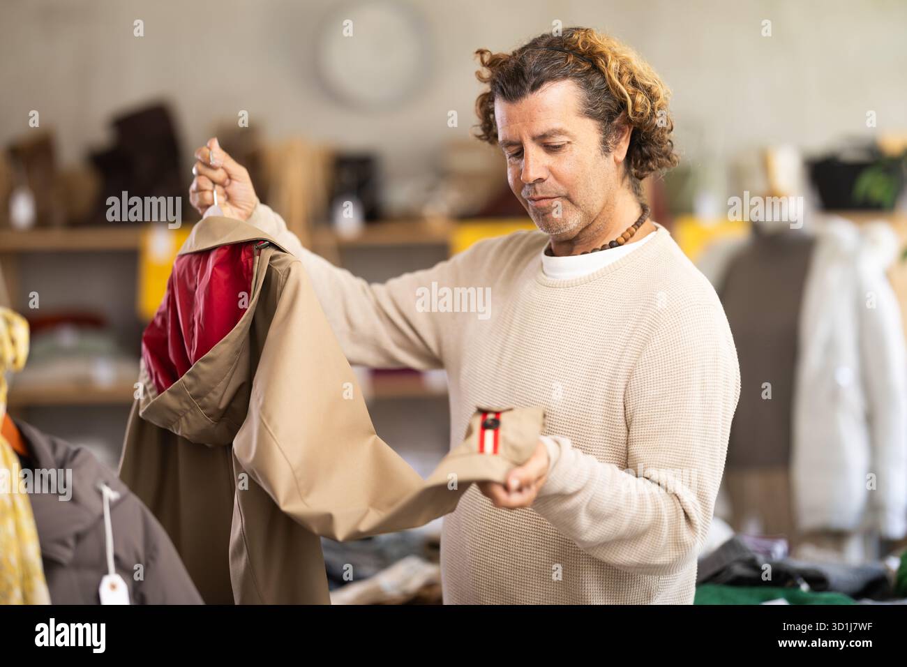 Beige trench coat hi-res stock photography and images - Alamy
