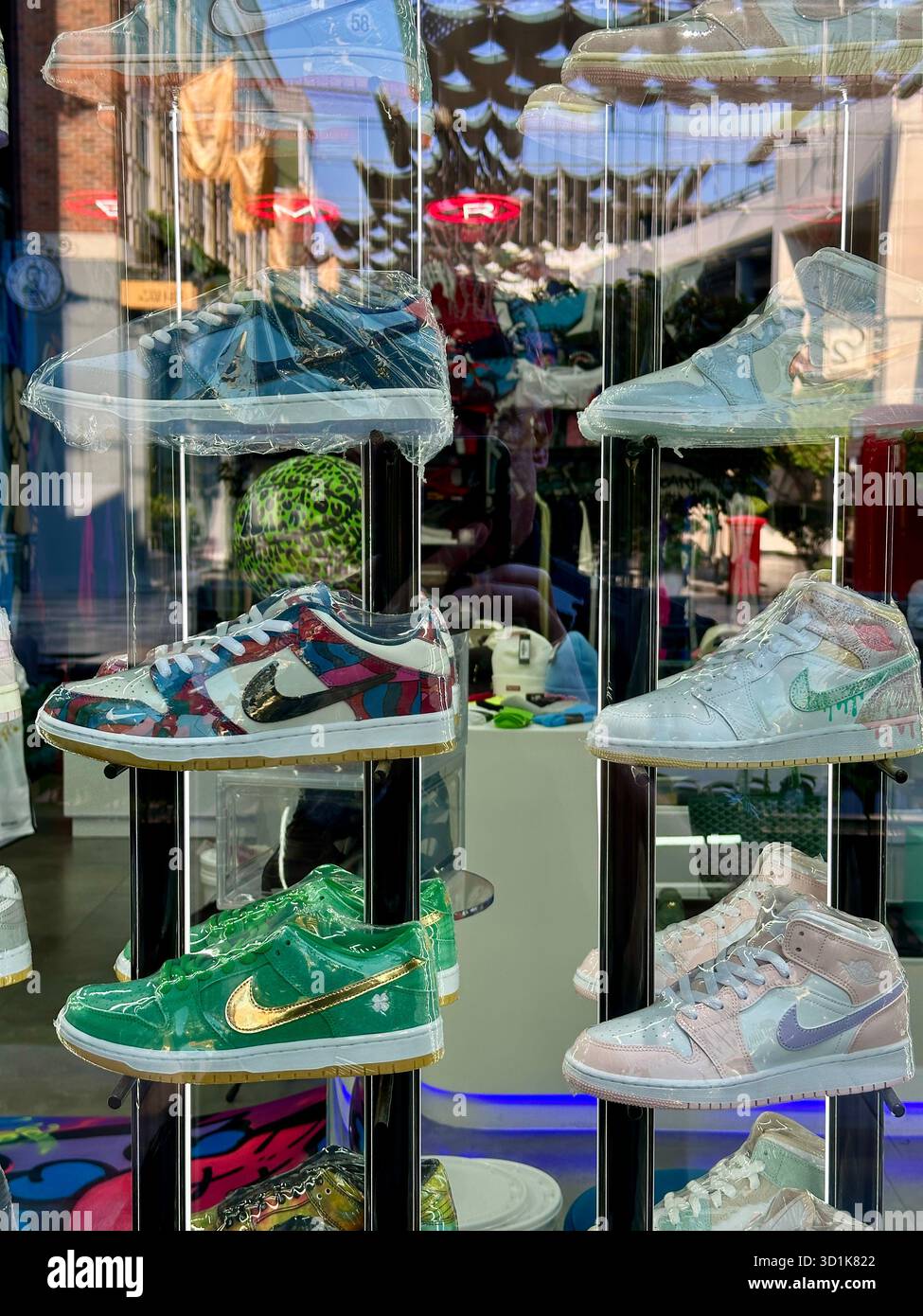 Nike trainers in shop window - Smartphone Captured Stock Image
