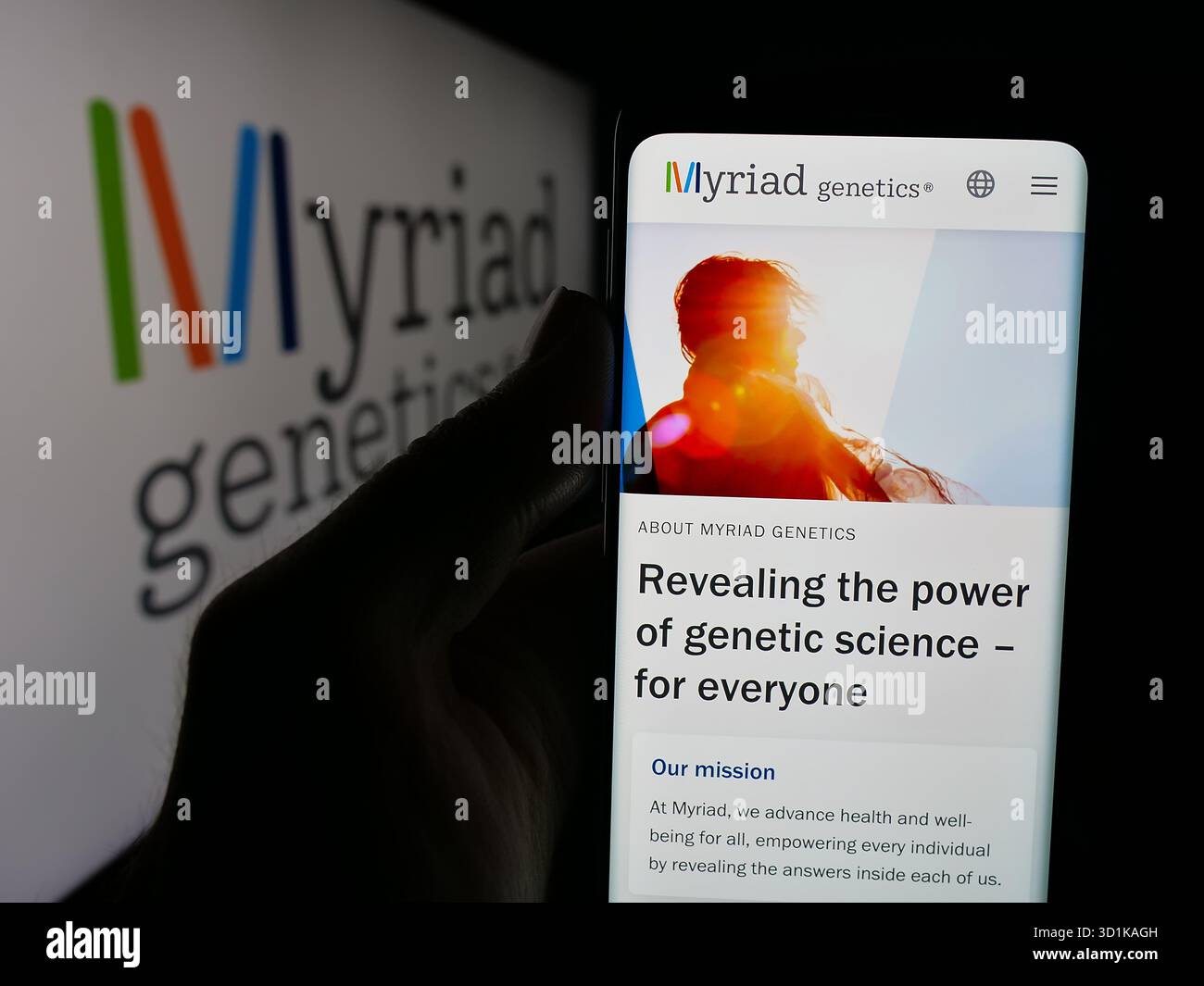 Myriad Testing In this photo illustration, a person is holding a cellphone with the ...