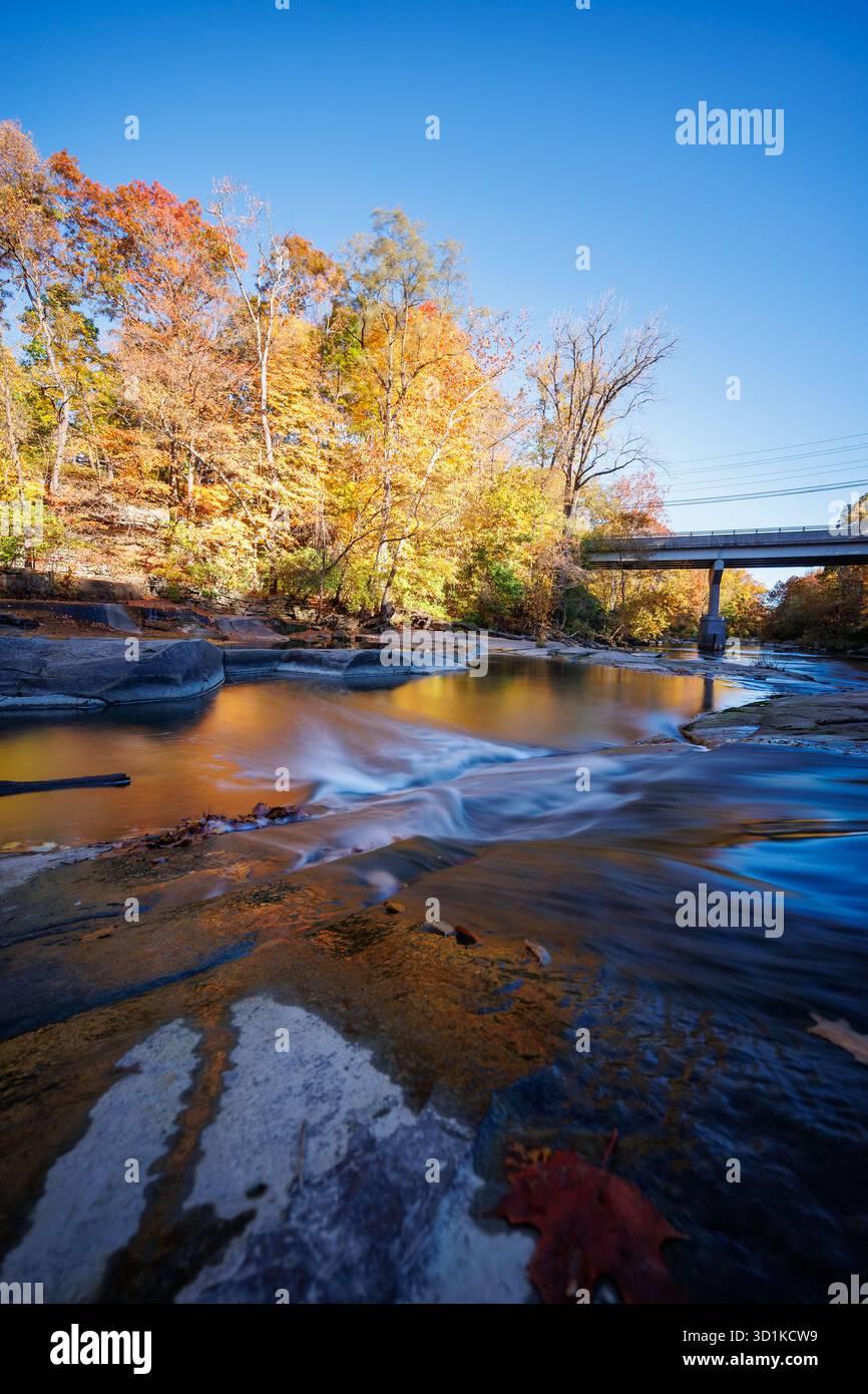 With Rivers Raring Below Long bridge river under hi-res stock photography and images - Alamy