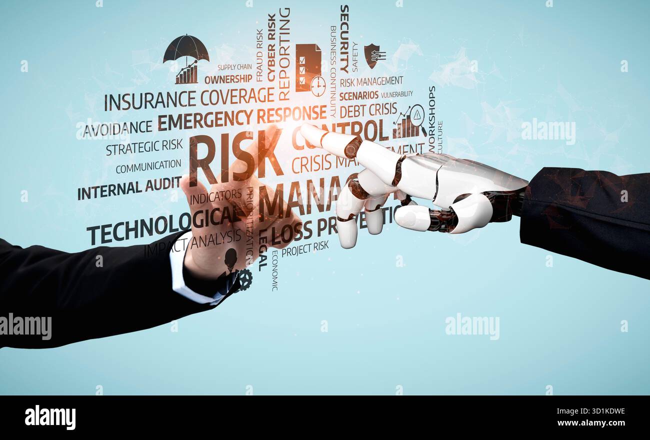A dynamic interaction between a human and robotic hand illustrates the synergy of technology and human expertise in effective risk management and Stock Photo