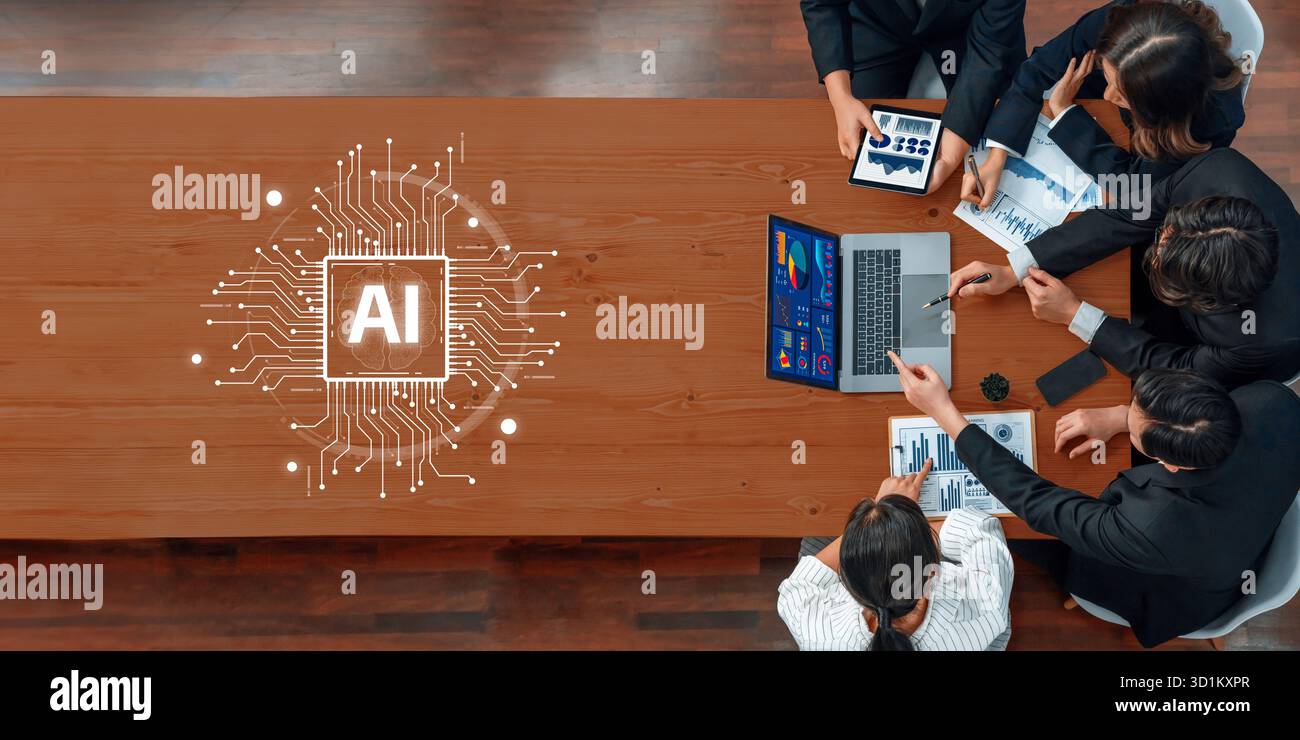 A diverse team of professionals collaborates on an artificial intelligence project, utilizing technology to analyze data and develop innovative strate Stock Photo