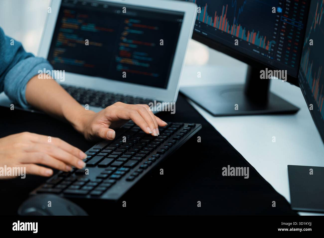 Cropped hands image of IT developer creating with typing information on pc with coding program information data website application, wearing jeans shi Stock Photo
