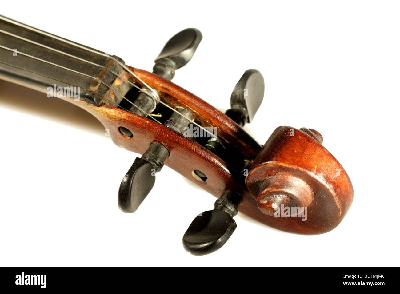 Violin scroll isolated on white background Stock Photo