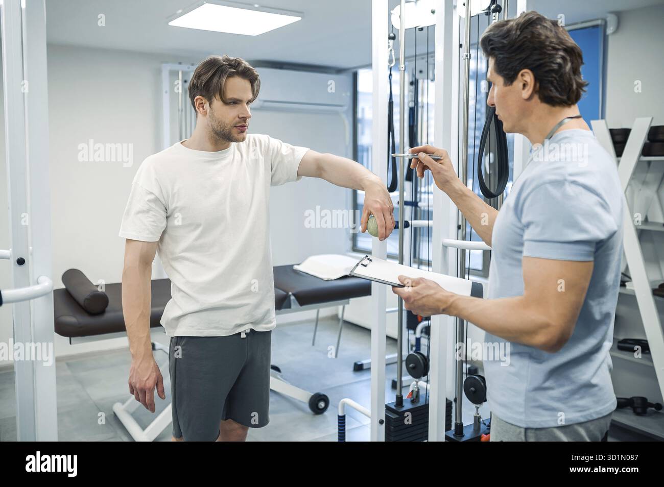 Pt Has Physical therapy. Male patient have a physical therapy session in ...
