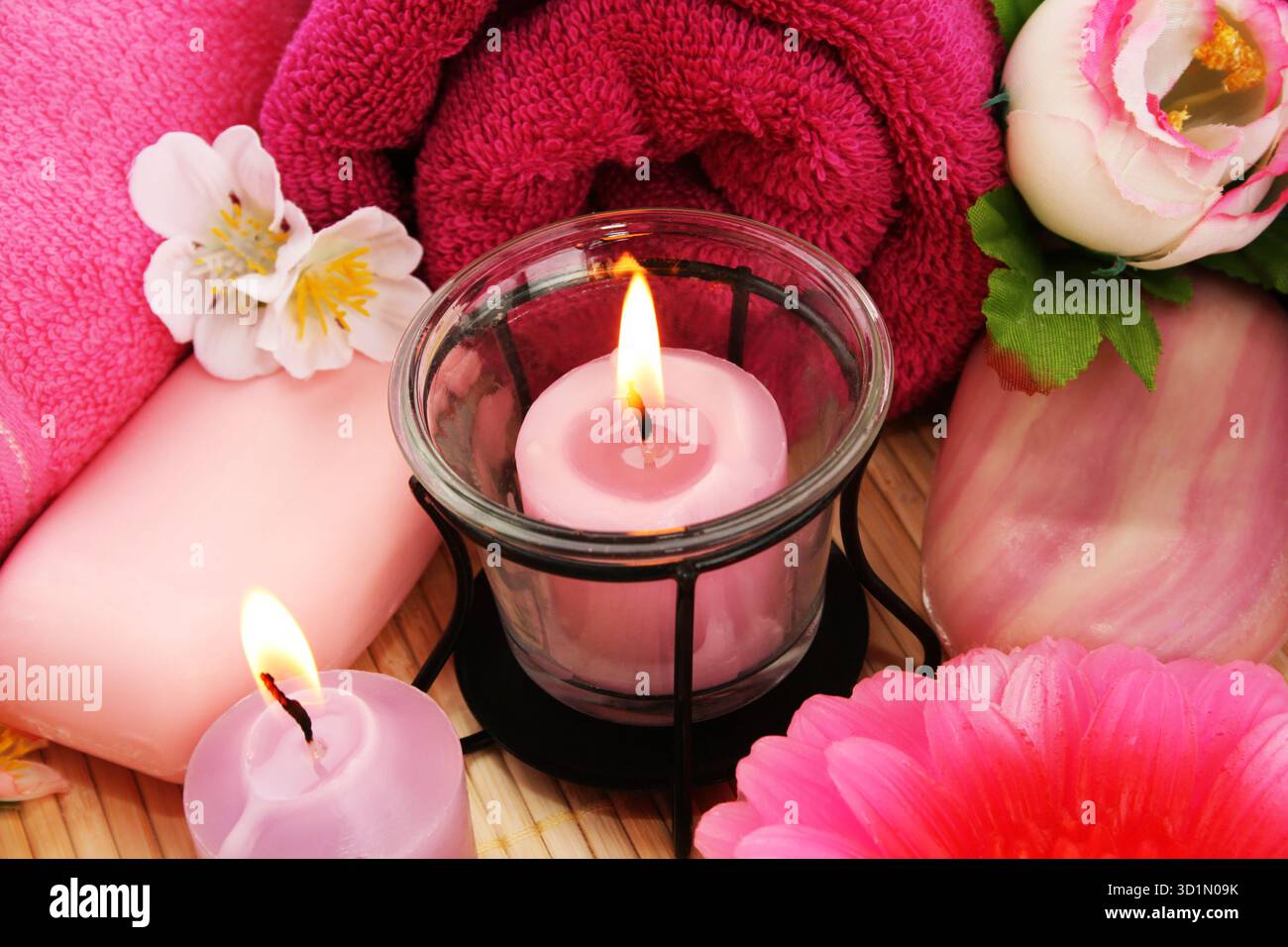 Towels, soaps, flowers, candles Stock Photo