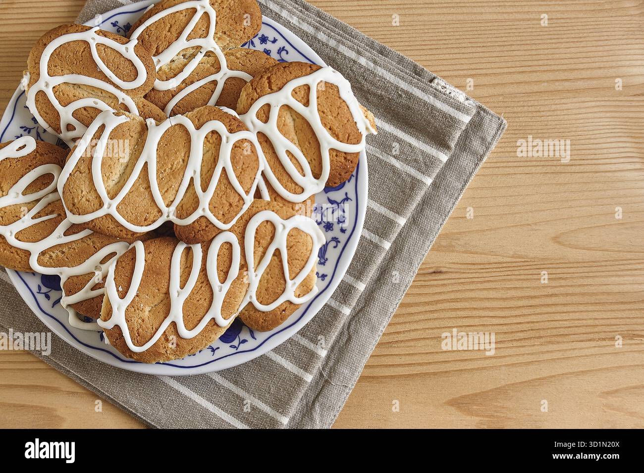 Composition with biscuits on a wooden table with sugar and teaspoon Stock Photo