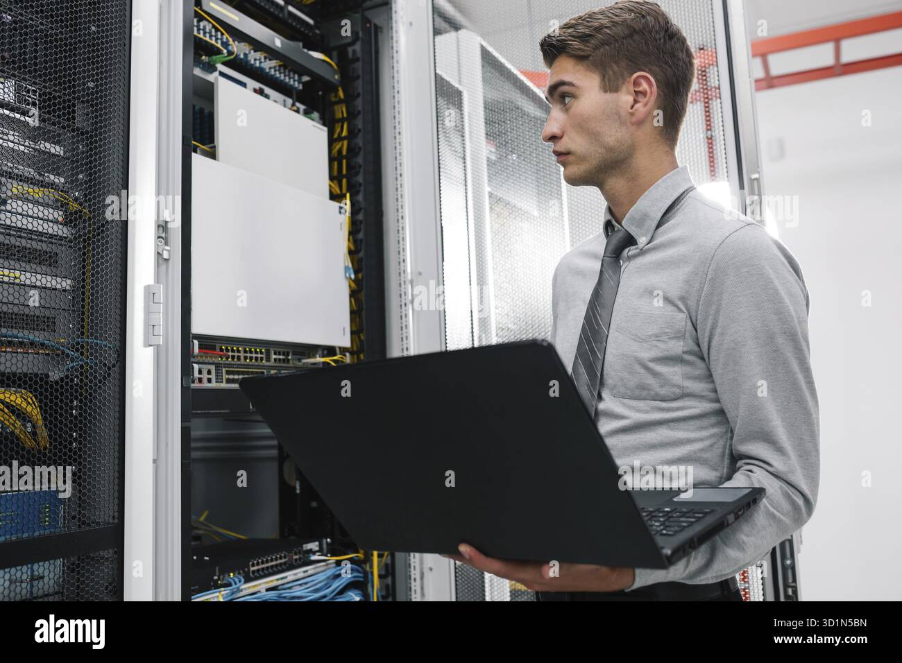 IT expert checking supercomputer server Stock Photo
