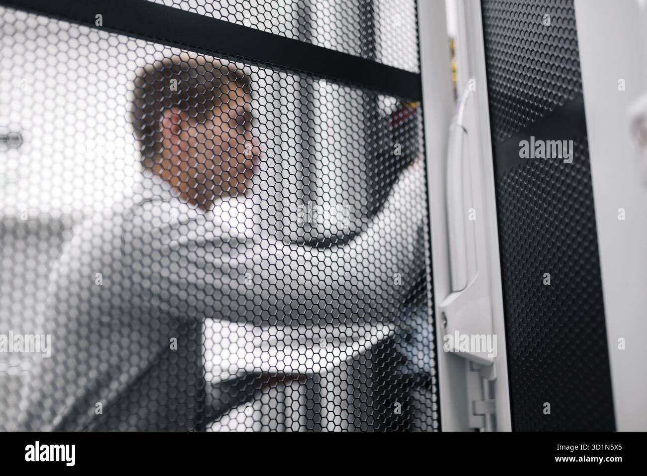 Man fix server network in data center room Stock Photo