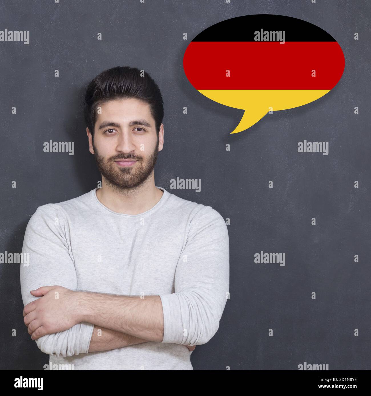 Man learn speaking german in bubble on chalkboard Stock Photo