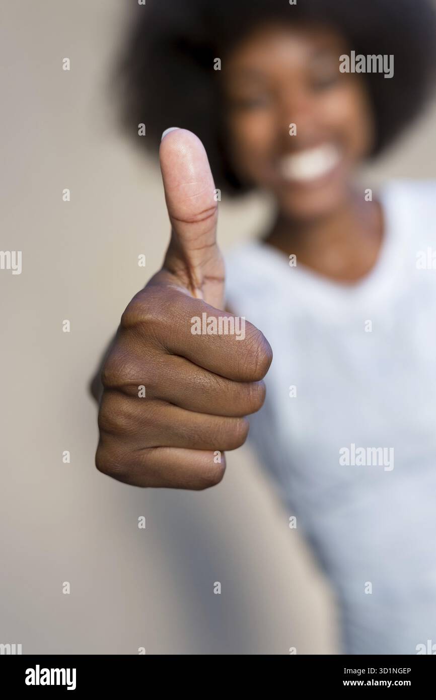African american woman thumbs up hi-res stock photography and images ...