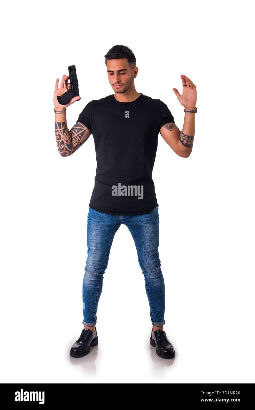 Handsome man holding gun hi-res stock photography and images - Alamy